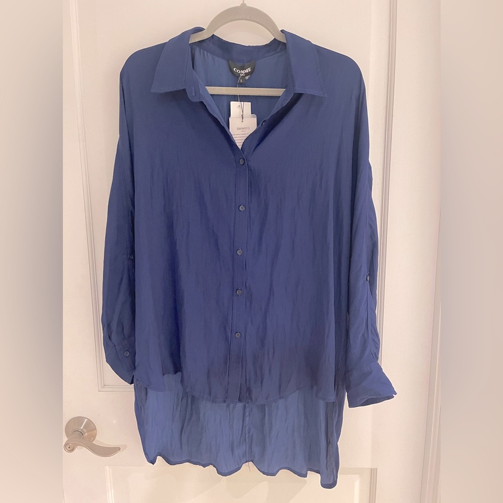 NEW with tags! Button down shirt, flowy, over sized look. Satin effect. Size L